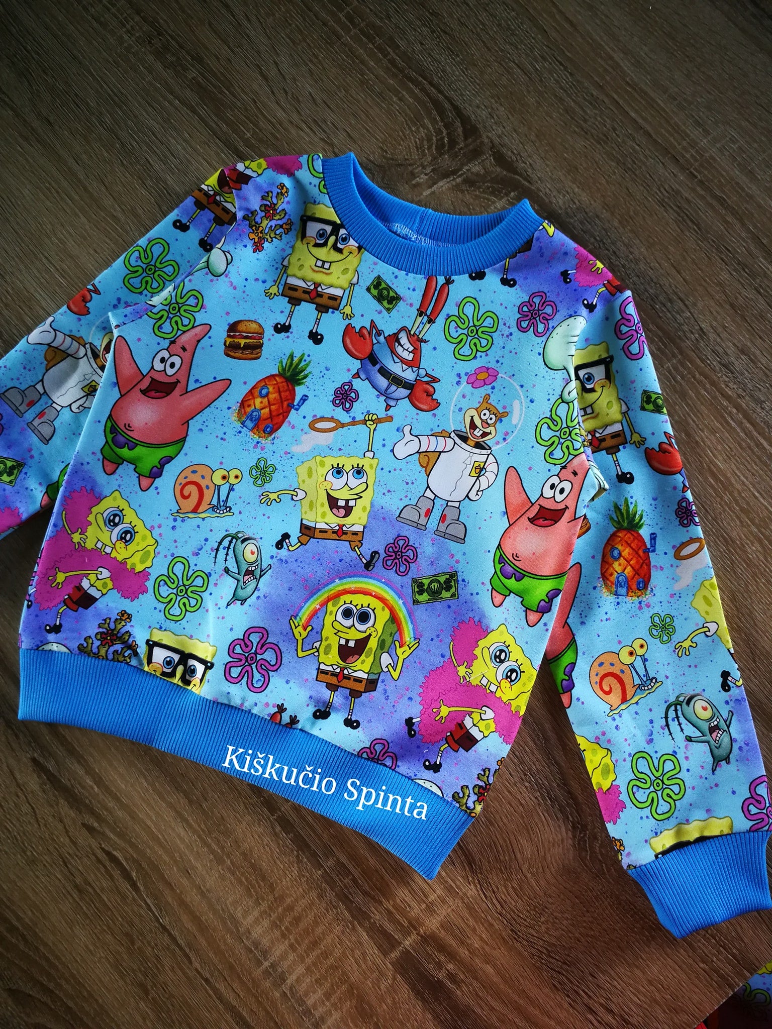 Megztukas"Kempiniukas" 104 dydis